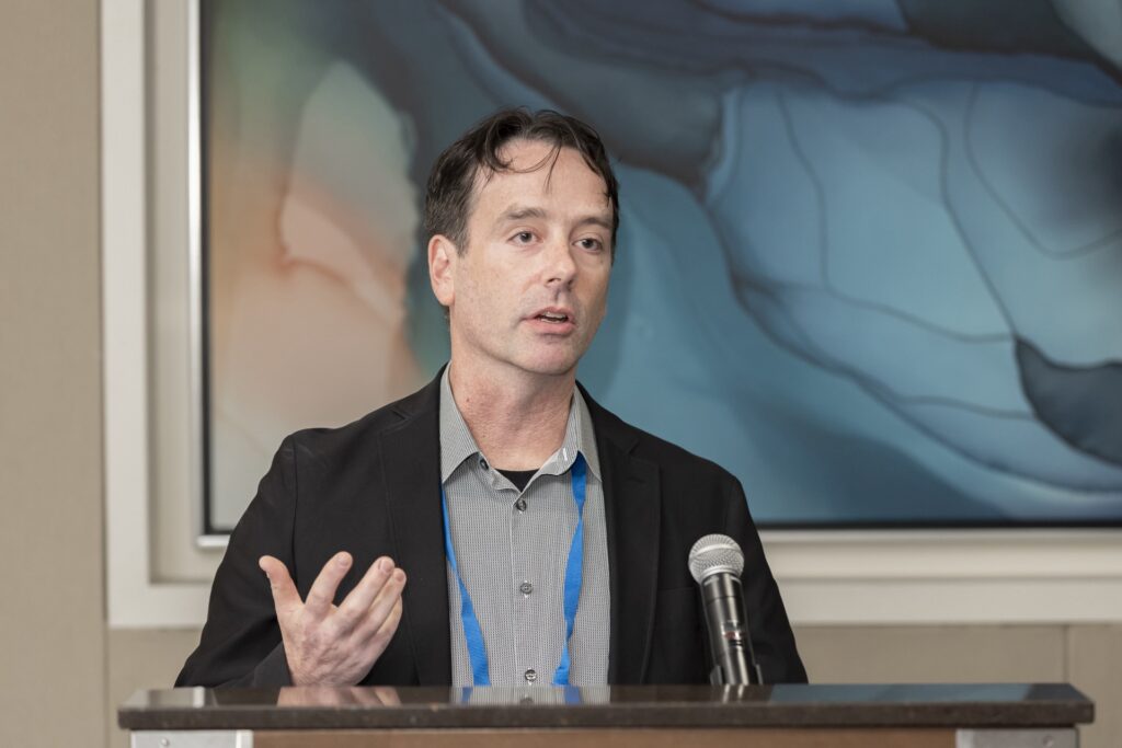 Man speaking at the AES conference in Orlando Florida